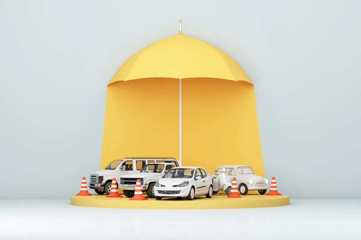 A group of cars under a yellow umbrella

Description automatically generated