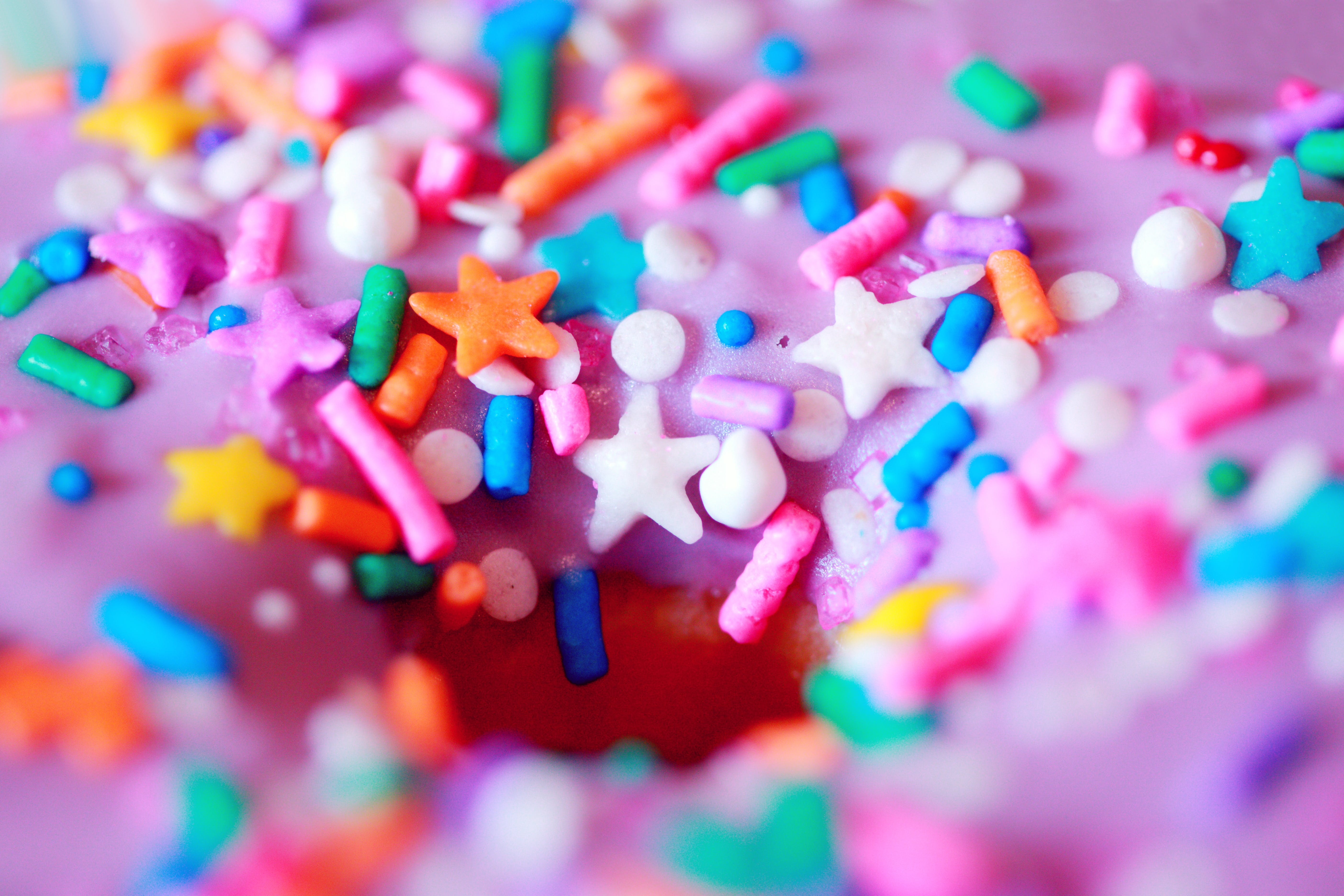 Free Doughnut Topped with Colorful Sprinkles in Tilt-Shift Lens Stock Photo