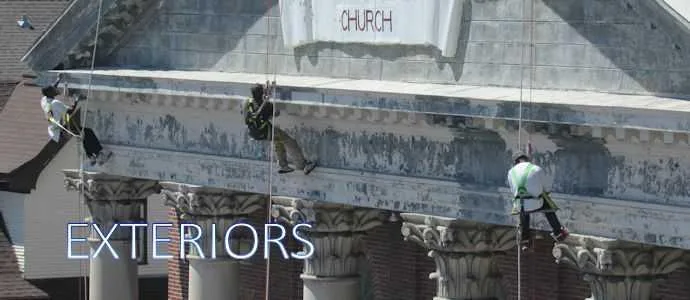 Steeplejacks painting the church portico